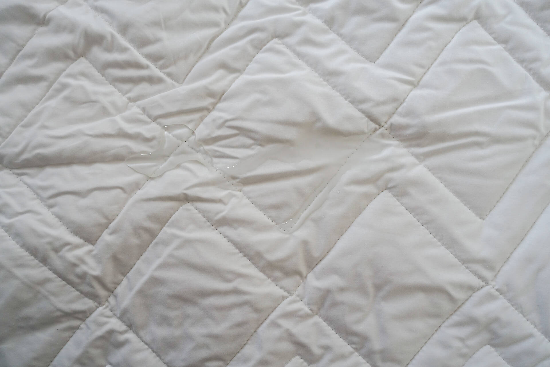 water on the simba mattress protector